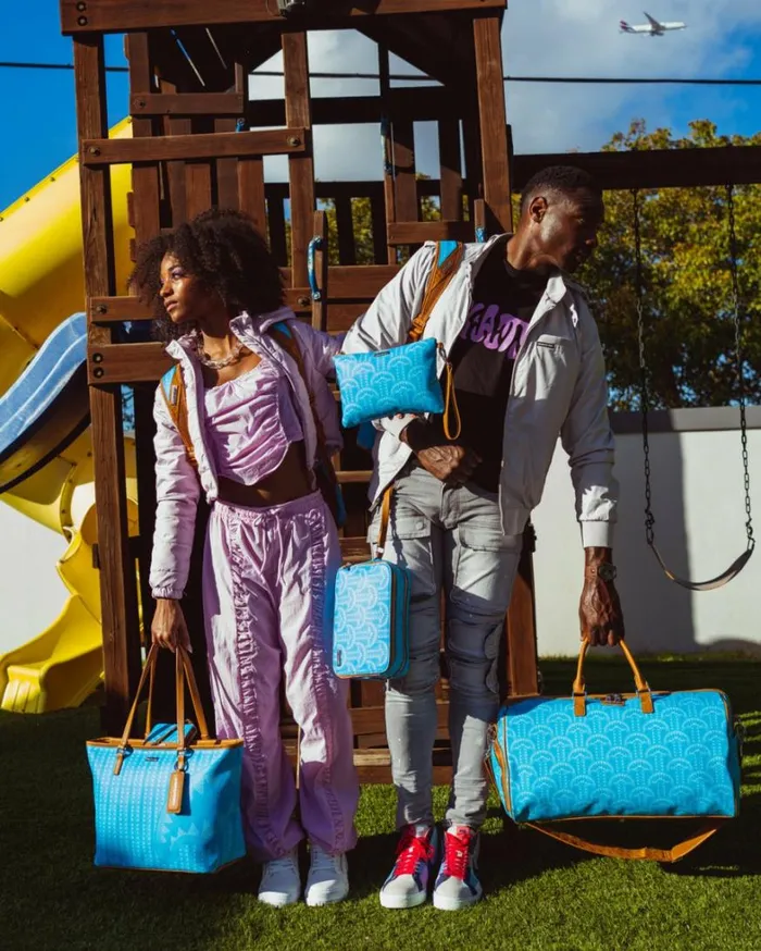 Bags SPRAYGROUND ILLUCHAINS TURQ CROSSOVER CLUTCH Bags SPRAYGROUND ILLUCHAINS TURQ CROSSOVER CLUTCH