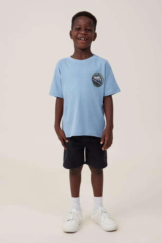 Boys 214 Tops and TShirts Cotton On License Drop Shoulder Short Sleeve Tee Lcn Uni Dusty Bluejurassic Park