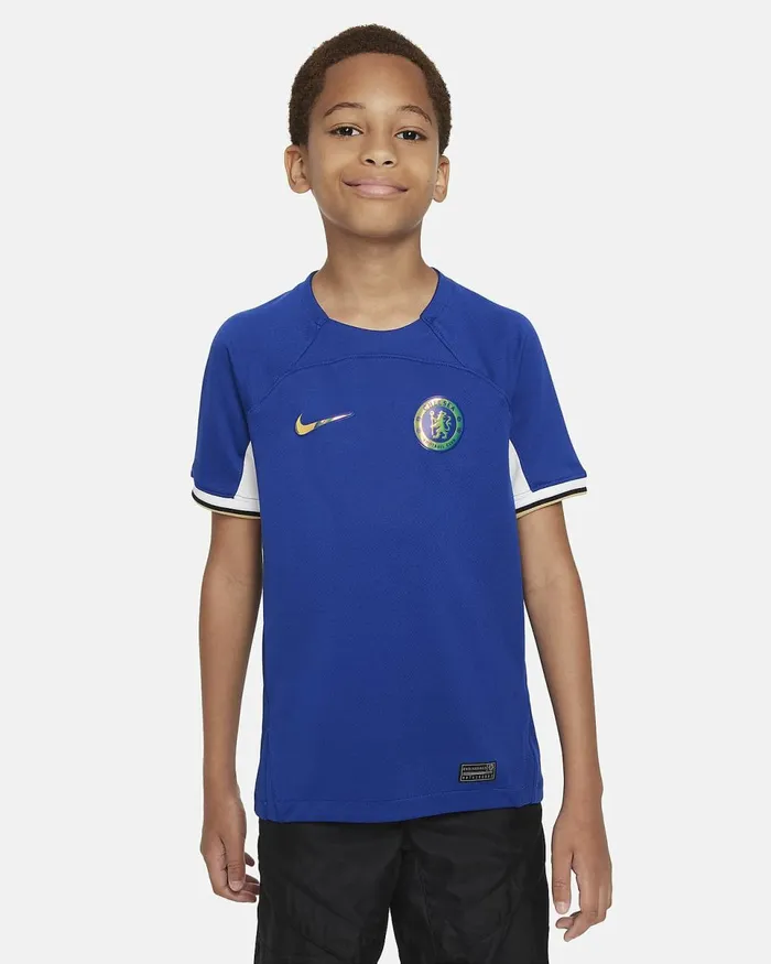 Kids Chelsea FC 202324 Stadium Home Rush Bluewhiteclub Gold Nike Tops And TShirts Kids Chelsea FC 202324 Stadium Home Rush Bluewhiteclub Gold Nike Tops And TShirts
